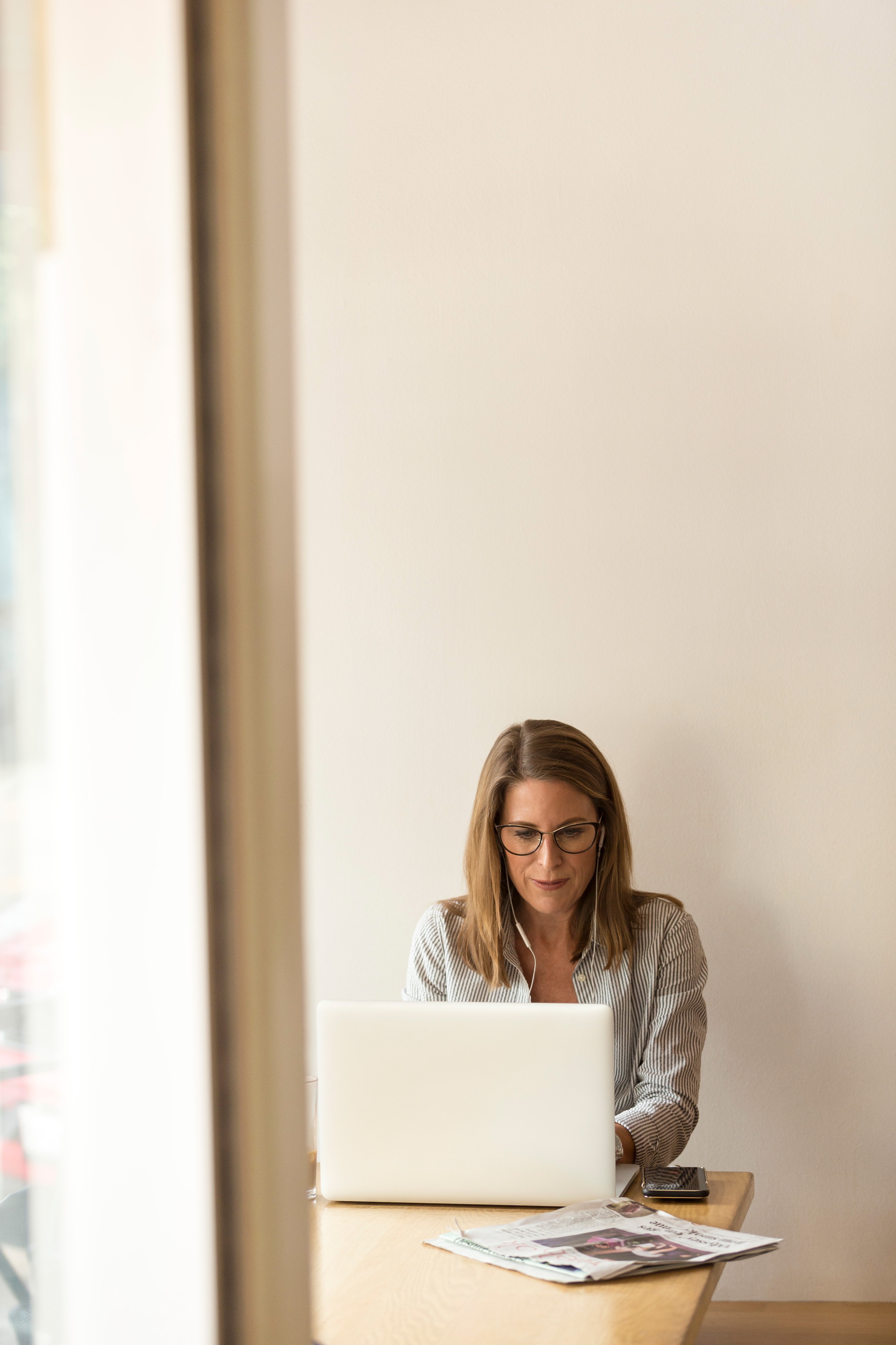 woman-sitting-while-using-laptop-1251828