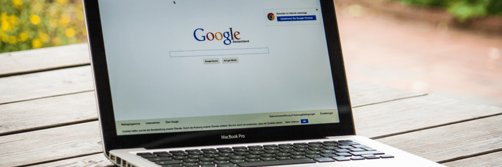 Laptop opened to Google browser window. In May of 2019, it appears that a change was made in Google’s Algorithm for search. What is the impact of Google and Local Business?